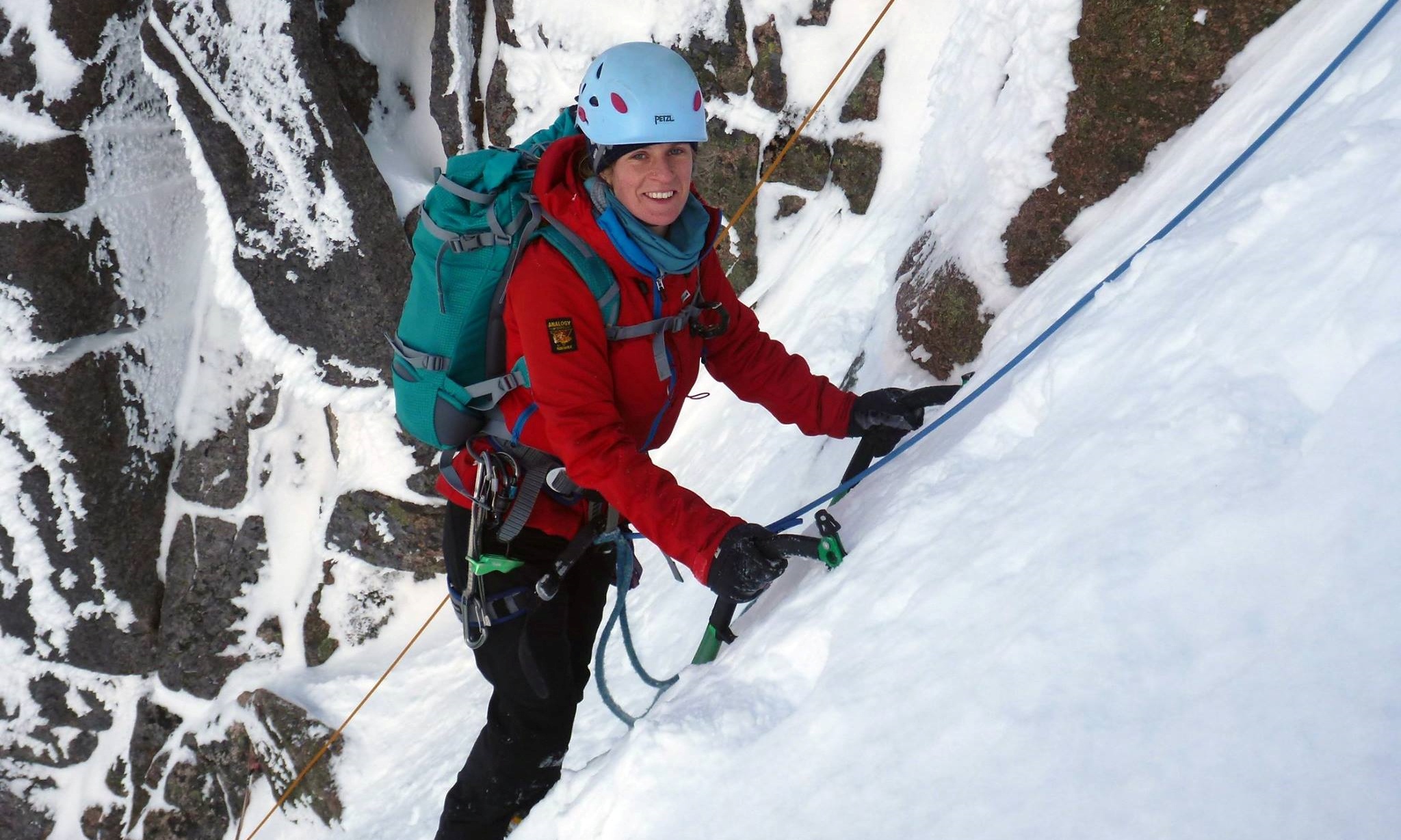 Crystal Patton on belay in a snow gully.