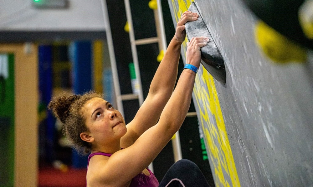 Darcey Haddow bouldering indoors