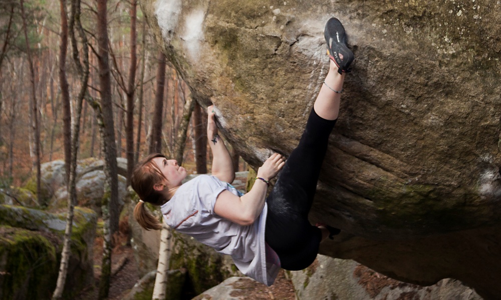 Rachel Carr bouldering in Fontainbleau