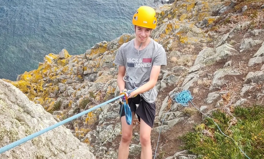 Judah abseiling