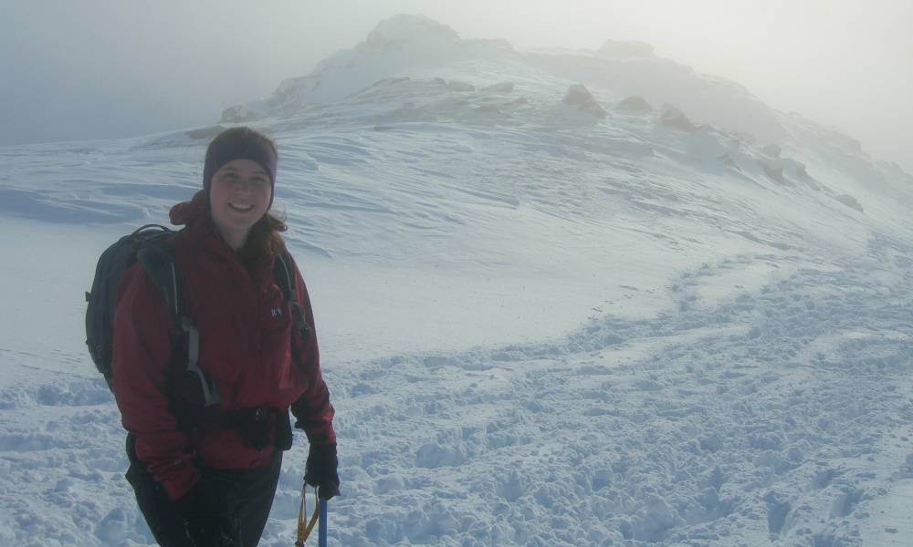 Cat Trebilco on a snowy Scottish summit